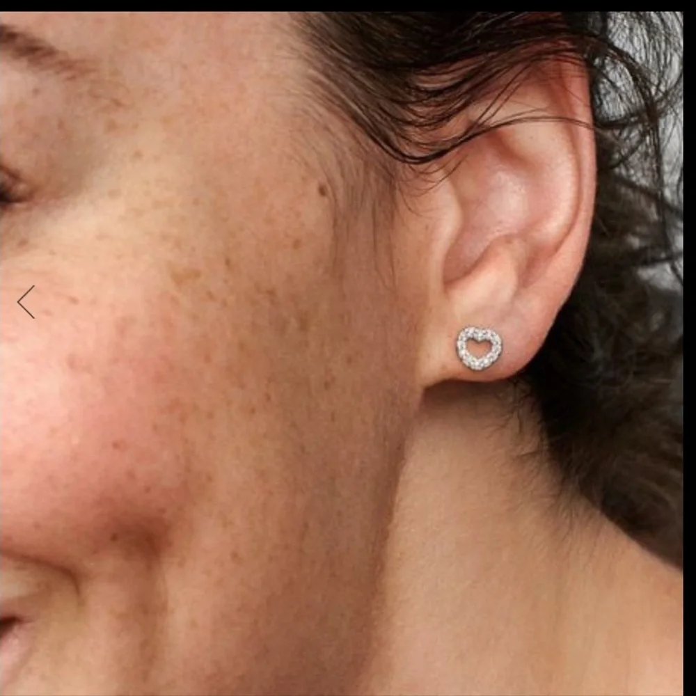 Elegant Silver Heart Stud Earrings - Picture 2 of 4